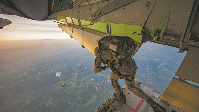 Airborne troops in parachuting training exercise